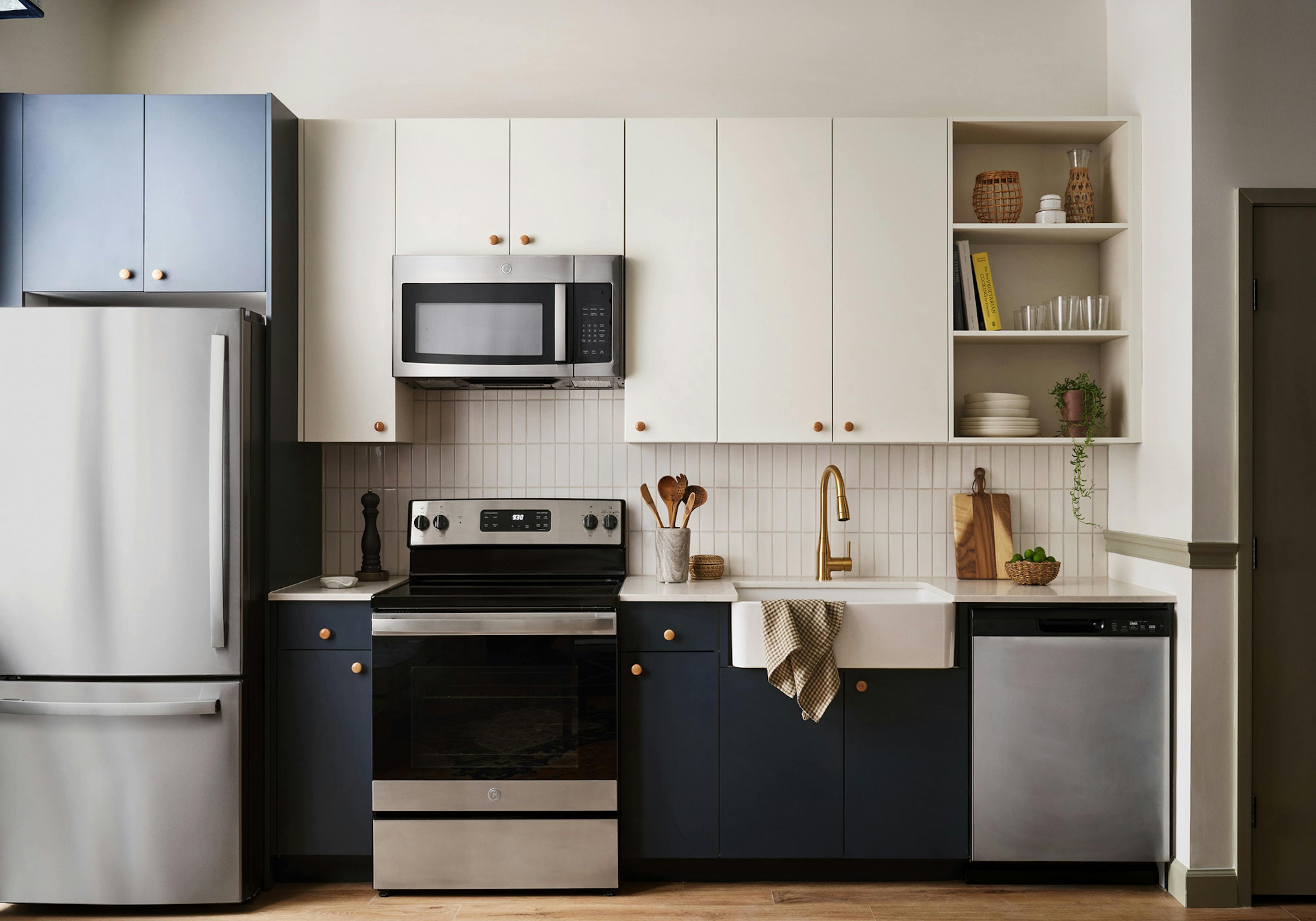 Kitchen with blue and white cabinets